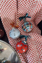 Load image into Gallery viewer, Three hand painted Christmas ornaments on a red and white checkered fabric background